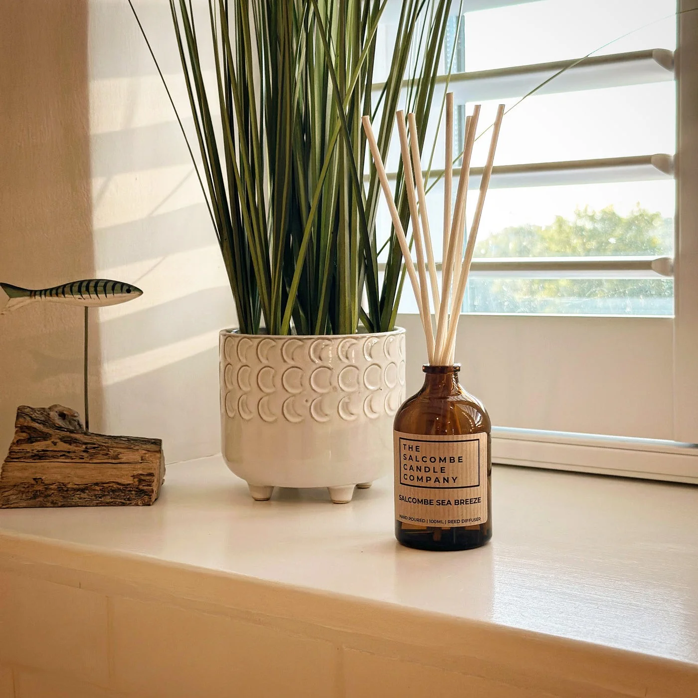 Salcombe Sea Breeze reed diffuser on a windowsill