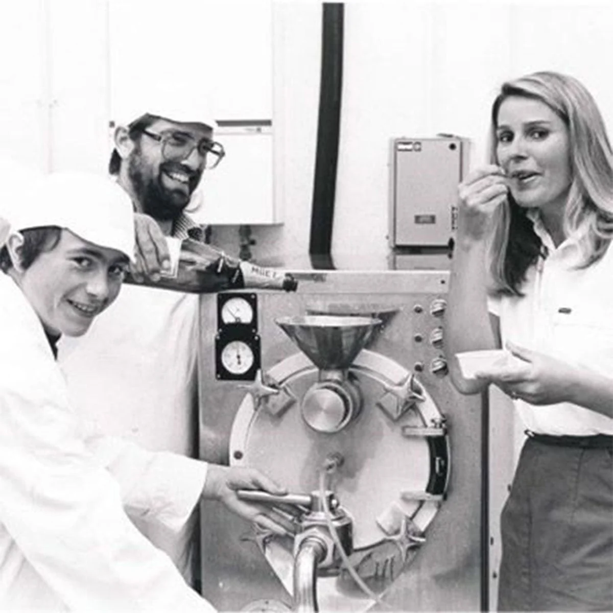 Salcombe Dairy team beside ice cream making equipment