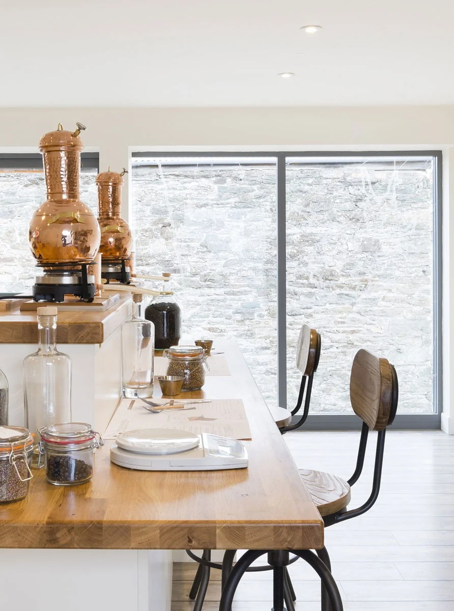Gin school workstations with miniature copper stills