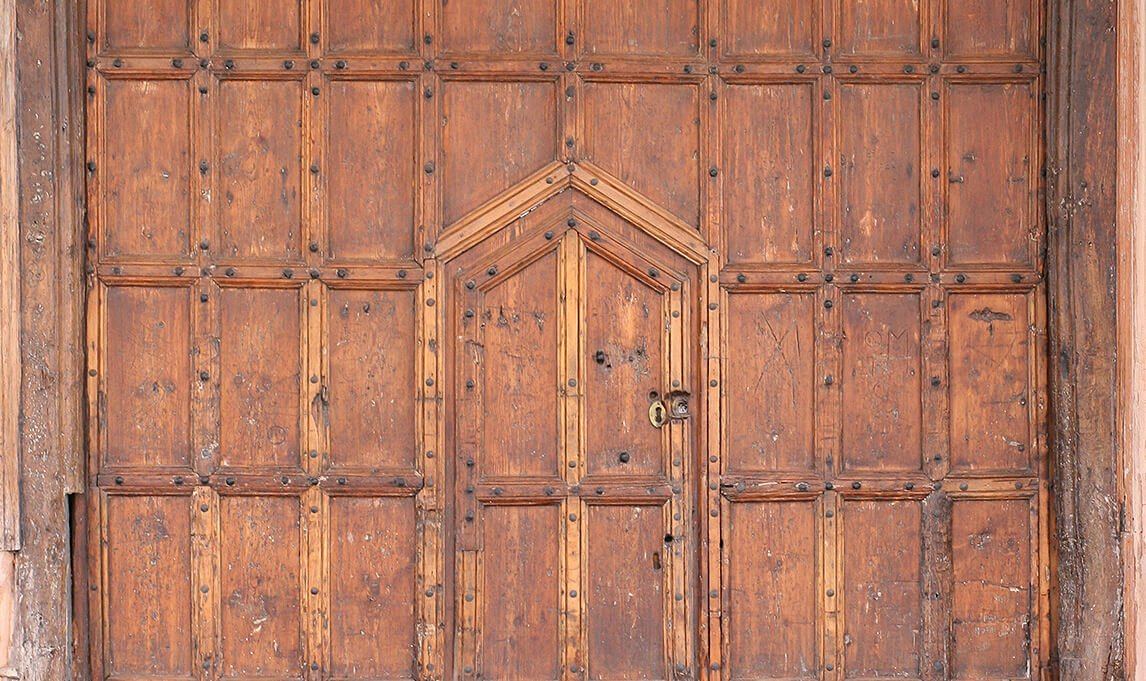 Carved timber entrance doors at The Salutation