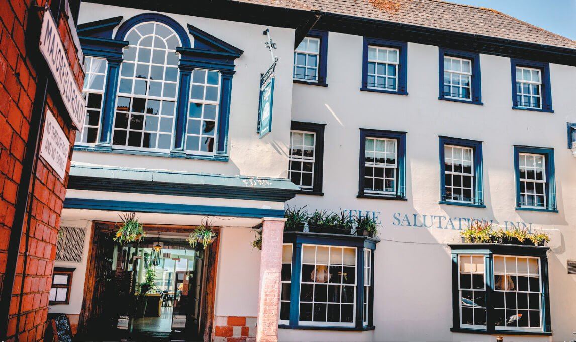 The Salutation Inn’s white frontage on Fore Street