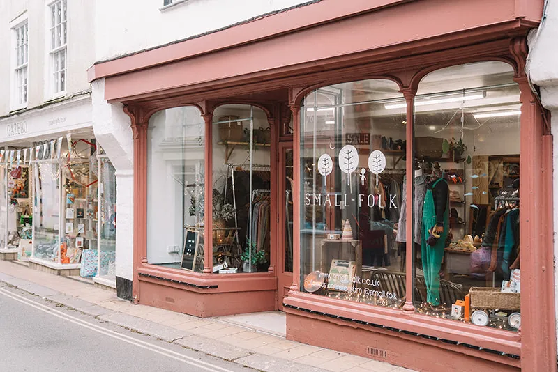 Rose-coloured SMALL-FOLK shopfront on Totnes High Street