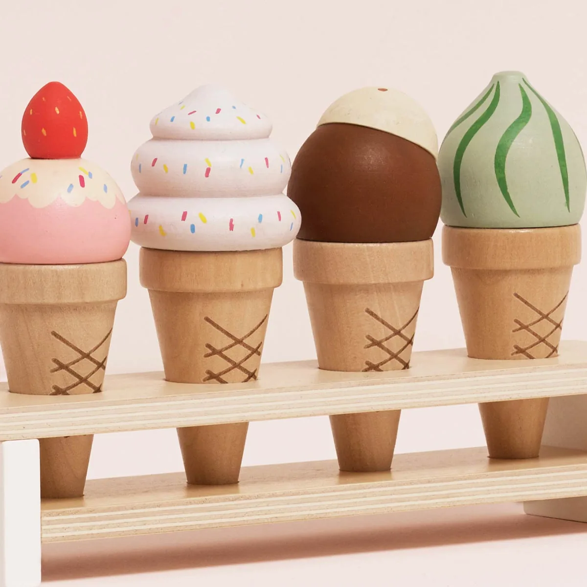 Wooden toy ice-cream cones in pastel colours from the SMALL-FOLK collection