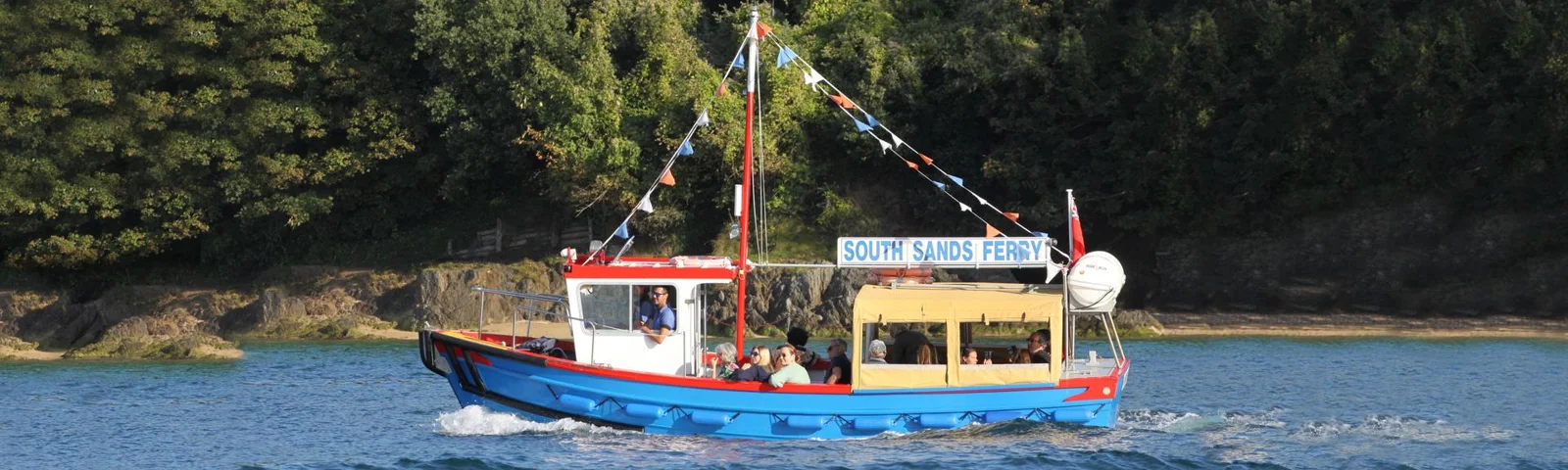 Colourful South Sands Ferry travelling along the estuary