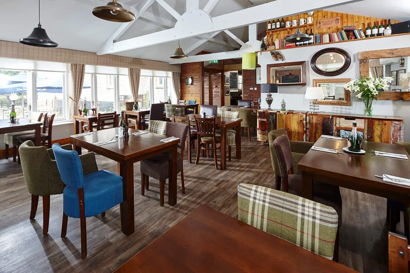 Light-filled conservatory dining room at The Steam Packet Inn
