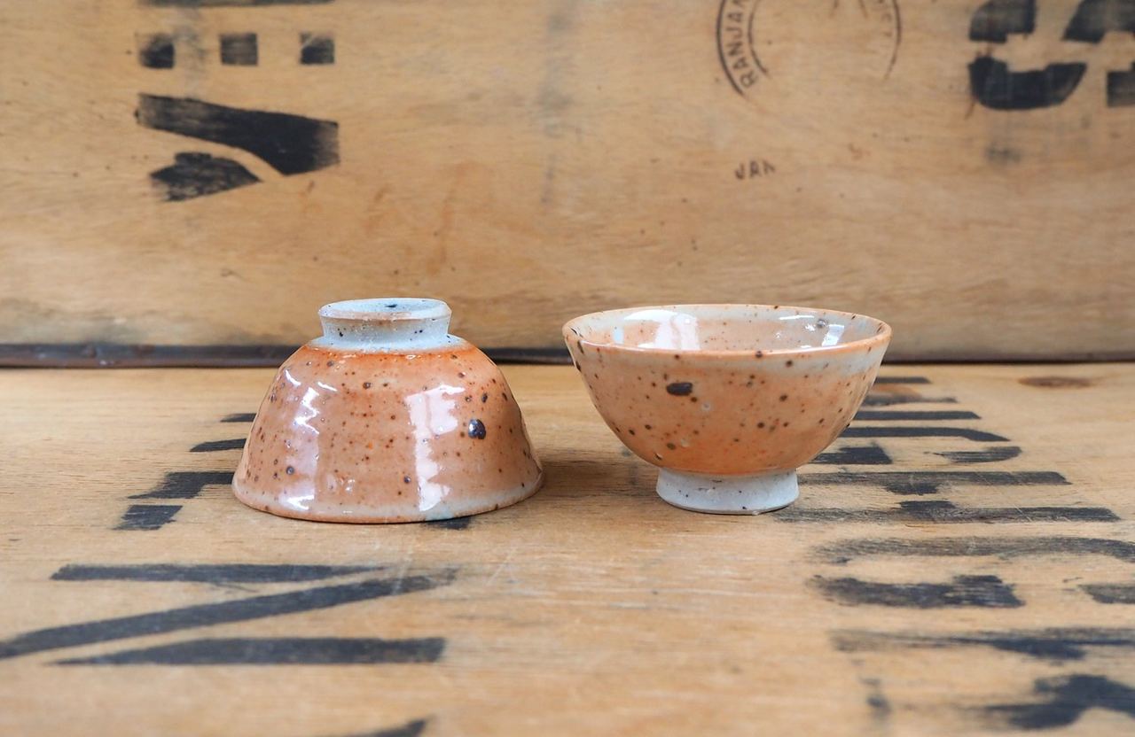 A pair of handmade ceramic tea bowls