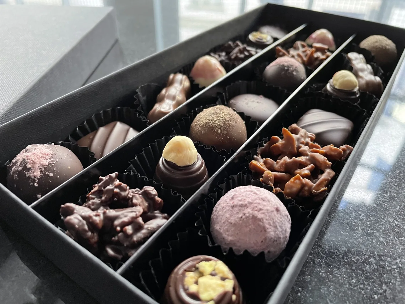A box of assorted handmade chocolates from Tempt