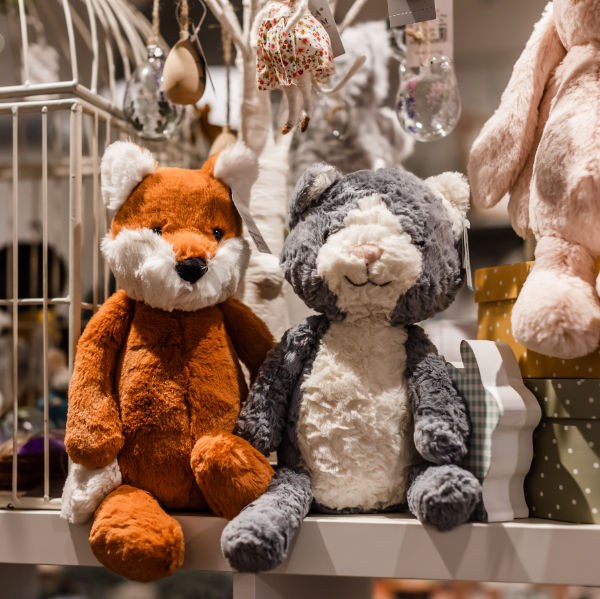 A soft toy fox and rabbit displayed at tessdesigns