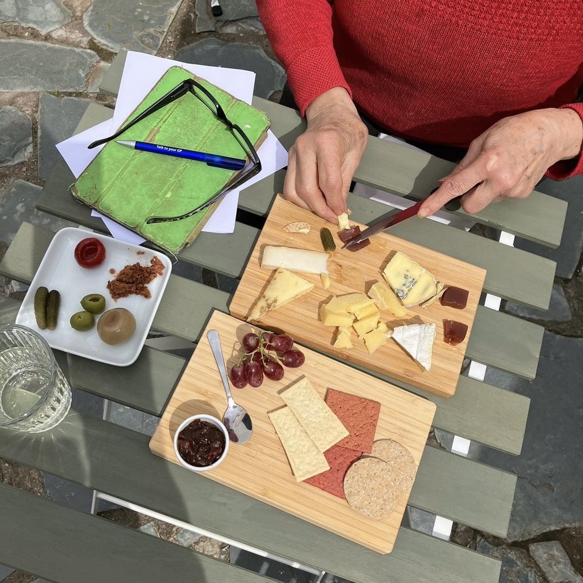 Cheese boards on a courtyard table