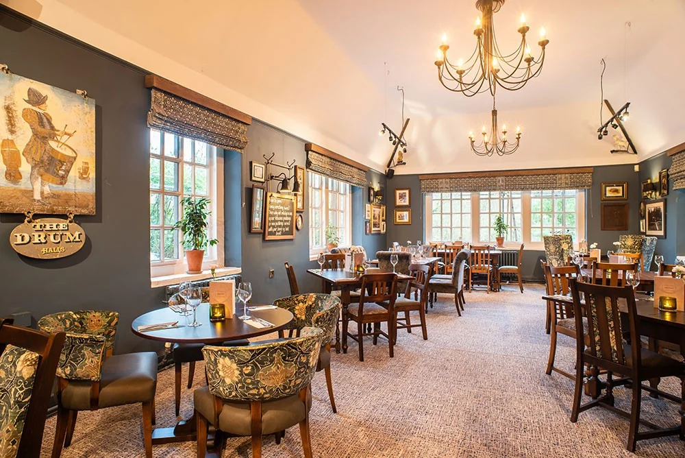 Dining tables inside The Drum Inn