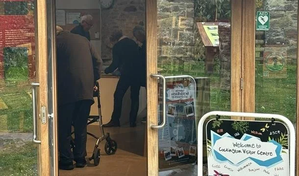 Open visitor-centre doorway at The Linhay