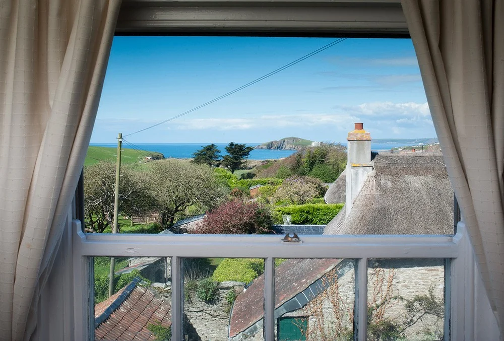 View from a Sloop Inn guest-room window towards the coast