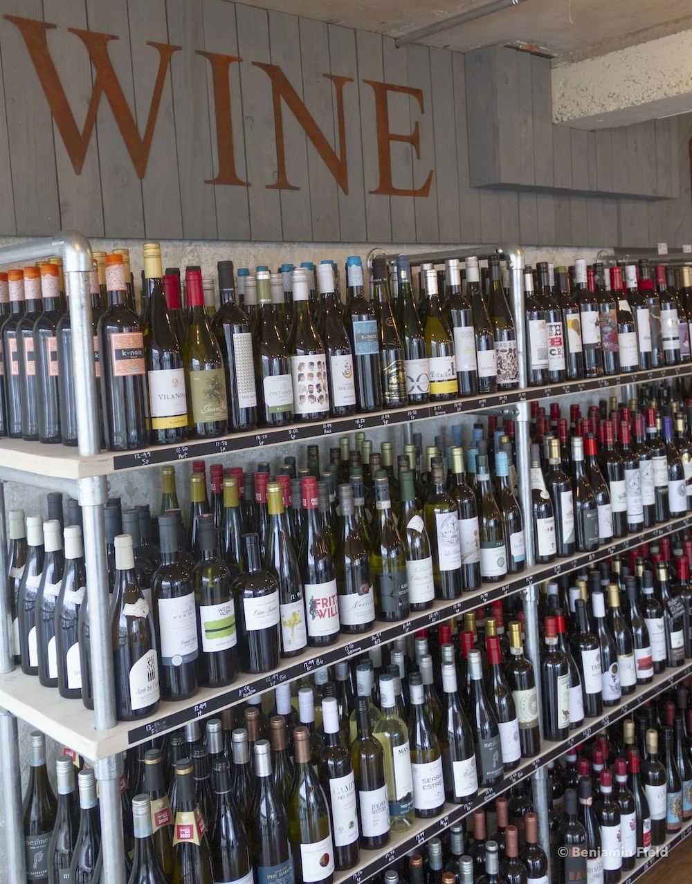 Shelves filled with wine bottles at The Wine Loft