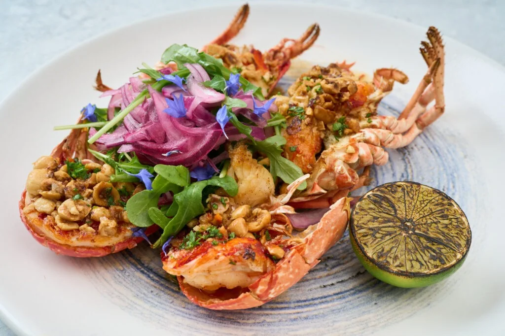 A lobster dish with colourful garnishes at Thirty Three by the Sea