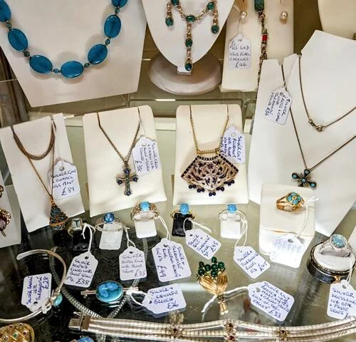 Necklaces and small jewellery displayed with price tags