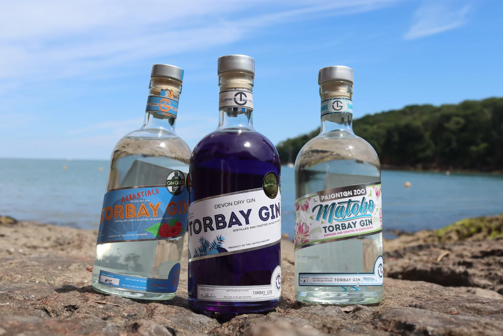 Torbay Gin, Aurantiaco and Matobo bottles photographed at Elberry Cove