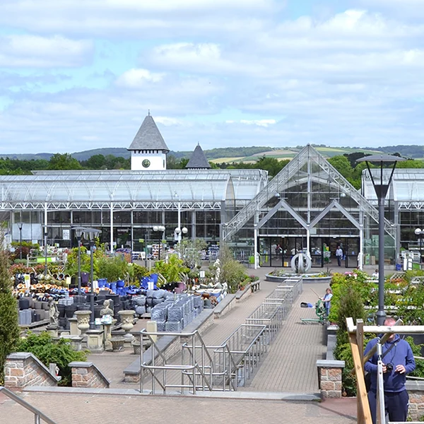 Plant benches outside the glass-fronted garden centre