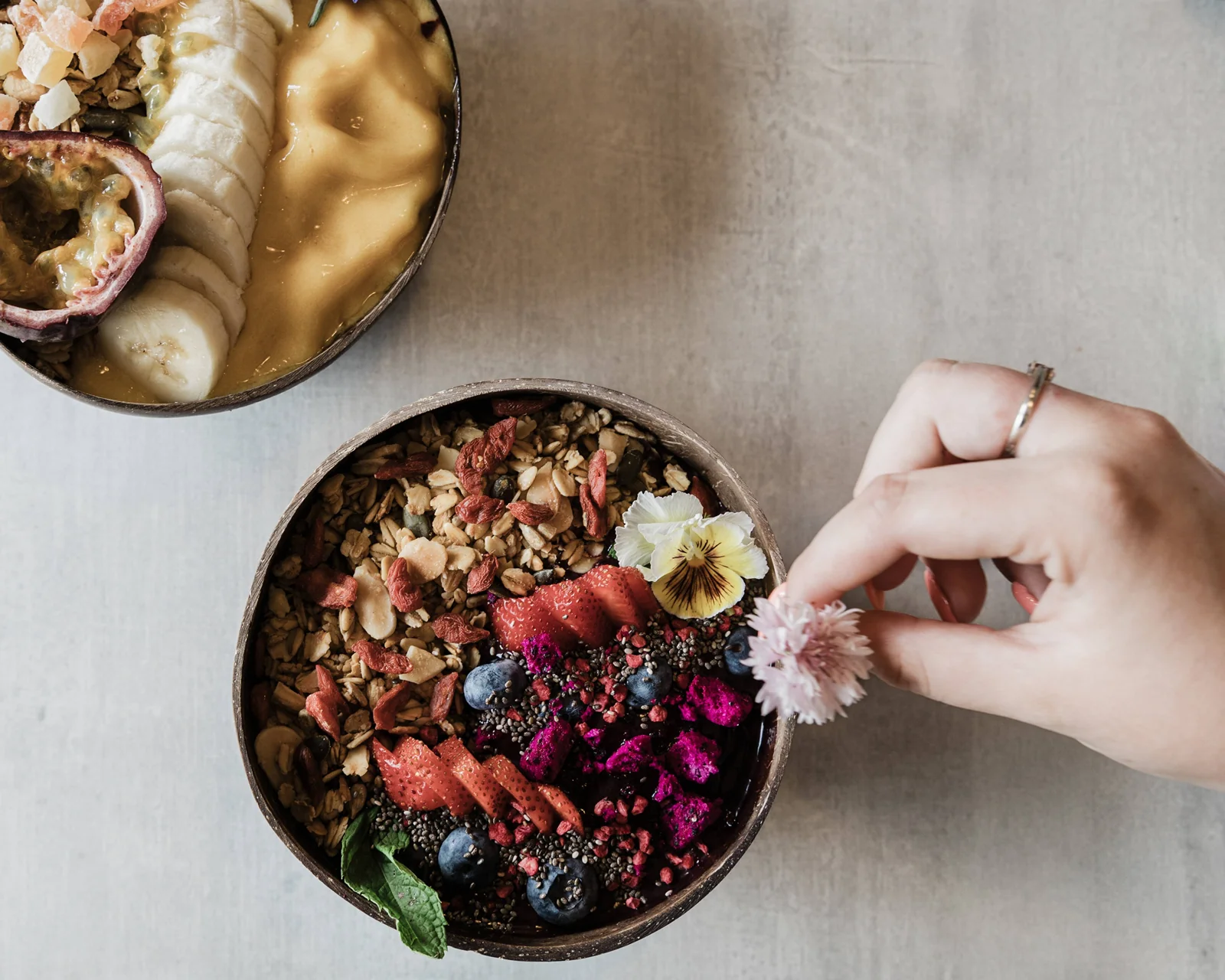 Colourful granola and fruit bowls at Wild Oats Kitchen