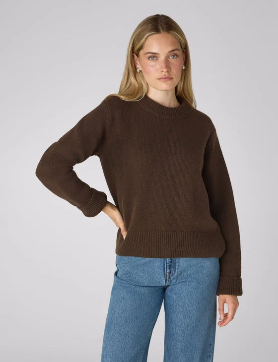 A model wearing With Nothing Underneath’s chocolate wool Devon Jumper
